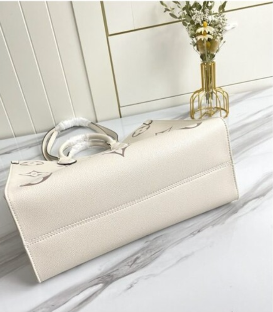 Louis Vuitton Onthego Leather Handbag