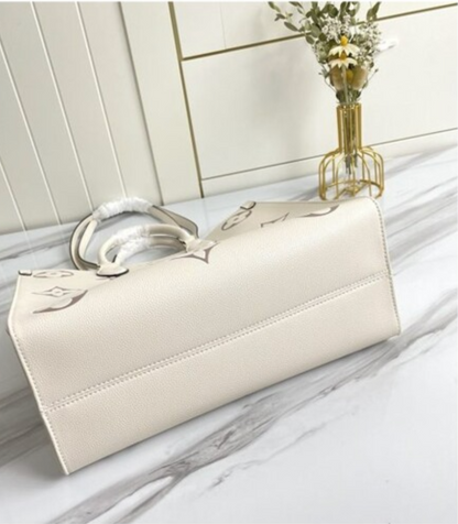 Louis Vuitton Onthego Leather Handbag